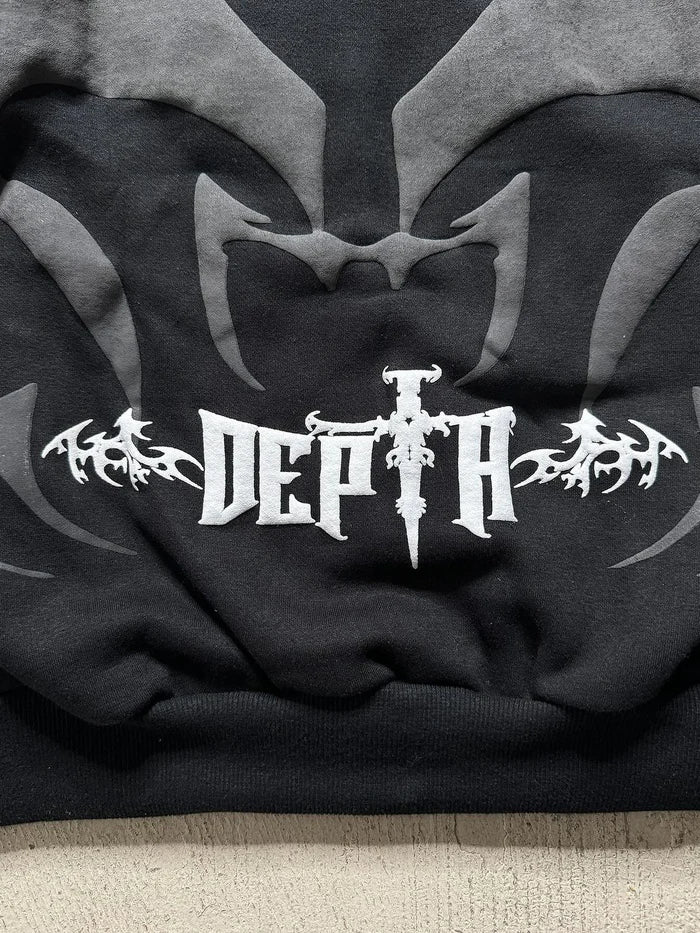 Tribal Shadow Depta Hoodie by Thread Shade – Unisex oversized hoodie featuring all-over puff print, hidden side pockets, and a relaxed fit. Made with 400gsm cotton fleece for ultimate comfort and style.