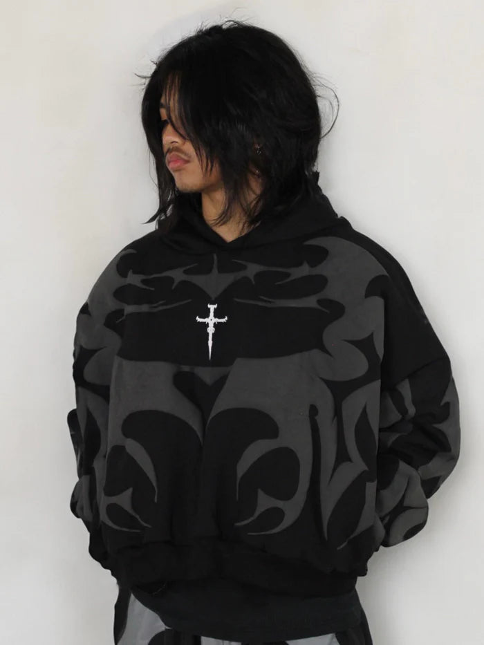 Tribal Shadow Depta Hoodie by Thread Shade – Unisex oversized hoodie featuring all-over puff print, hidden side pockets, and a relaxed fit. Made with 400gsm cotton fleece for ultimate comfort and style.