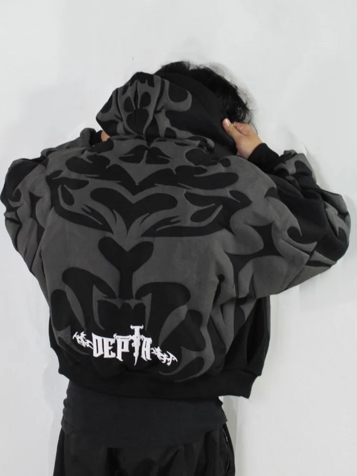 Tribal Shadow Depta Hoodie by Thread Shade – Unisex oversized hoodie featuring all-over puff print, hidden side pockets, and a relaxed fit. Made with 400gsm cotton fleece for ultimate comfort and style.