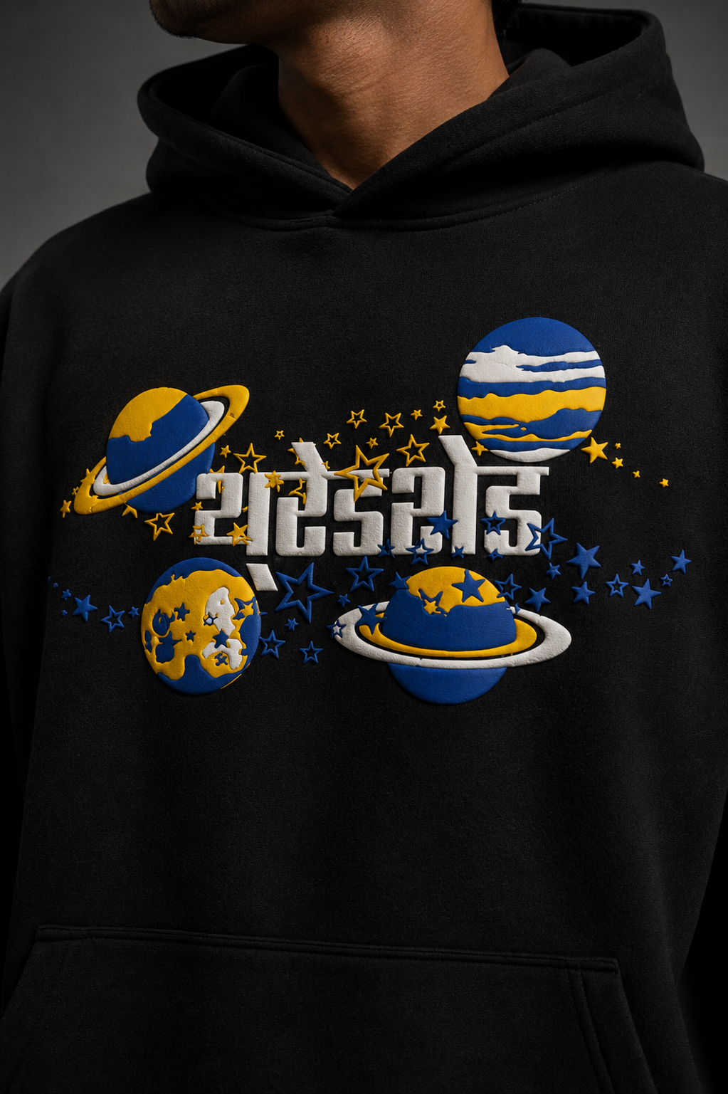 Close-up of premium puff print chest graphic on SHIVA // ORIGIN oversized hoodie.